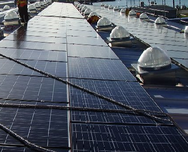 Enhancing the Value of a Commercial Rooftop Photovoltaic System with Tubular Daylighting